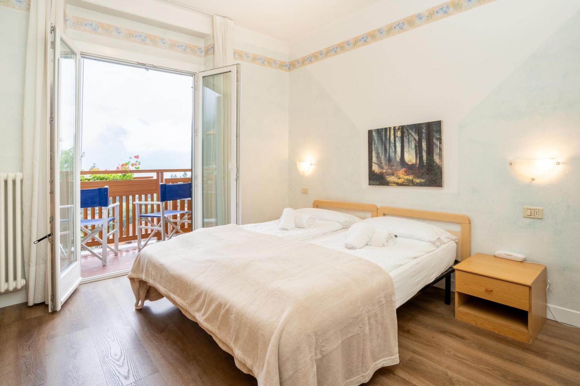 Hotel Europa Molveno Bagian luar foto